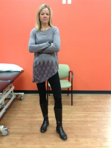 Crissy Ott standing with her hips oriented right and trunk rotating left.